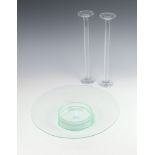 A circular Art Glass pedestal bowl 35cm diam. together with a pair of Art Glass candlesticks on
