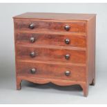 A 19th Century mahogany chest of 4 long drawers with turned ebonised handles, raised on bracket feet