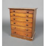 A Victorian pine collectors chest of 6 drawers with turned handles, raised on a platform base 46cm h