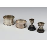 An Edwardian silver miniature pedestal rose bowl, Chester 1908, 2cm on a wooden socle, a ditto cup