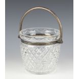 A Waterford Crystal glass ice bucket with silver plated swing handle 14cm