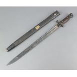 A Wilkinson 1907 patent bayonet complete with leather scabbard, the unmarked blade with broad arrow