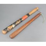 A Victorian turned and painted police truncheon (some paint loss) and 1 other plain turned truncheon