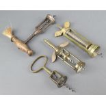 Two 19th Century twin pillar brass mechanical corkscrews and 2 other corkscrews
