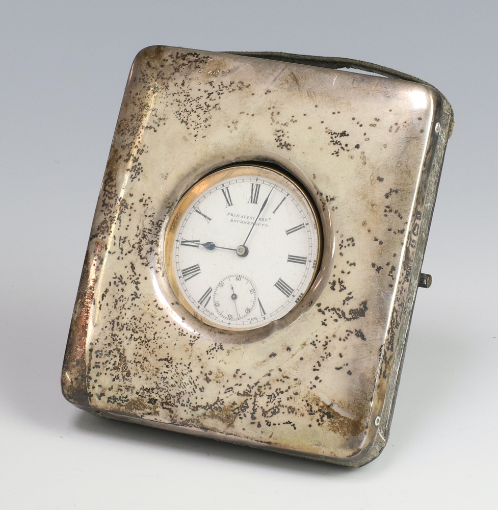 A Victorian silver watch case Birmingham 1900 containing a gun metal mechanical pocket watch