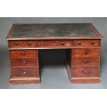 A Victorian mahogany partners desk with inset green leather writing surface, the frieze fitted 2