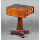 A William IV mahogany drop flap pedestal work table fitted 2 drawers and 2 dummy drawers, raised