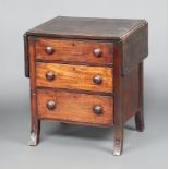 A 19th Century mahogany chest of 3 drawers with turned handles and flaps to the sides, raised on