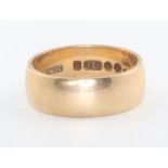 A 9ct yellow gold wide wedding band 5.2 grams, size O
