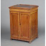 A 19th Century mahogany pedestal free standing cabinet with 3/4 gallery above an interior fitted