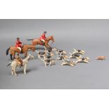 New Forest Toys, Brockenhurst, a carved wooden hunting group comprising 2 huntsmen with rider, 1