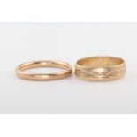 Two 9ct yellow gold wedding bands 5.7 grams, size N 1/2 and R 1/2