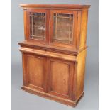 A Victorian mahogany chiffonier with raised back fitted a shelf enclosed by astragal glazed panelled