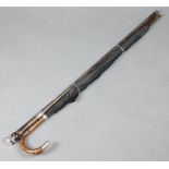 A Victorian silver walking cane with silver knop London 1849, one other and a silver mounted