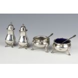 A Victorian silver table salt London 1892, 1 other and 3 condiments with 2 spoons 279 grams