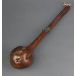 A 19th Century Fijian throwing club (I Ula Drisia) with bulbous root stock head, the centre of the
