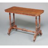 A Victorian rectangular mahogany stretcher table, raised on turned supports with H framed