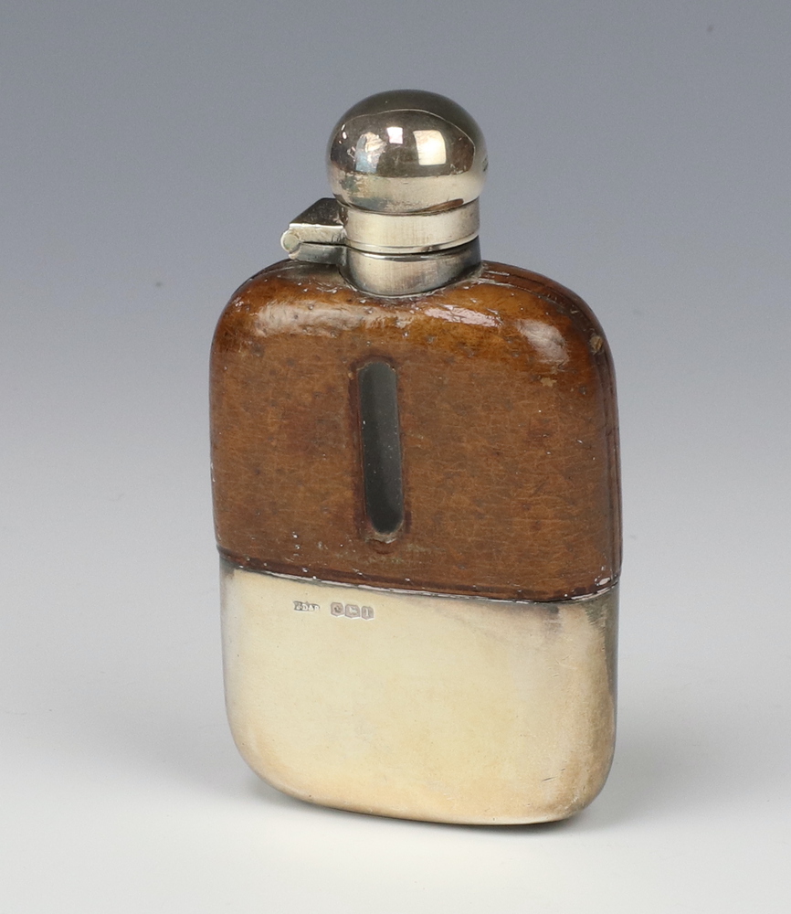 A small silver leather mounted hip flask with silver cup Sheffield 1928, 10cm