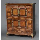 A 19th Century Korean hardwood cabinet fitted 3 short drawers above cupboard enclosed by a
