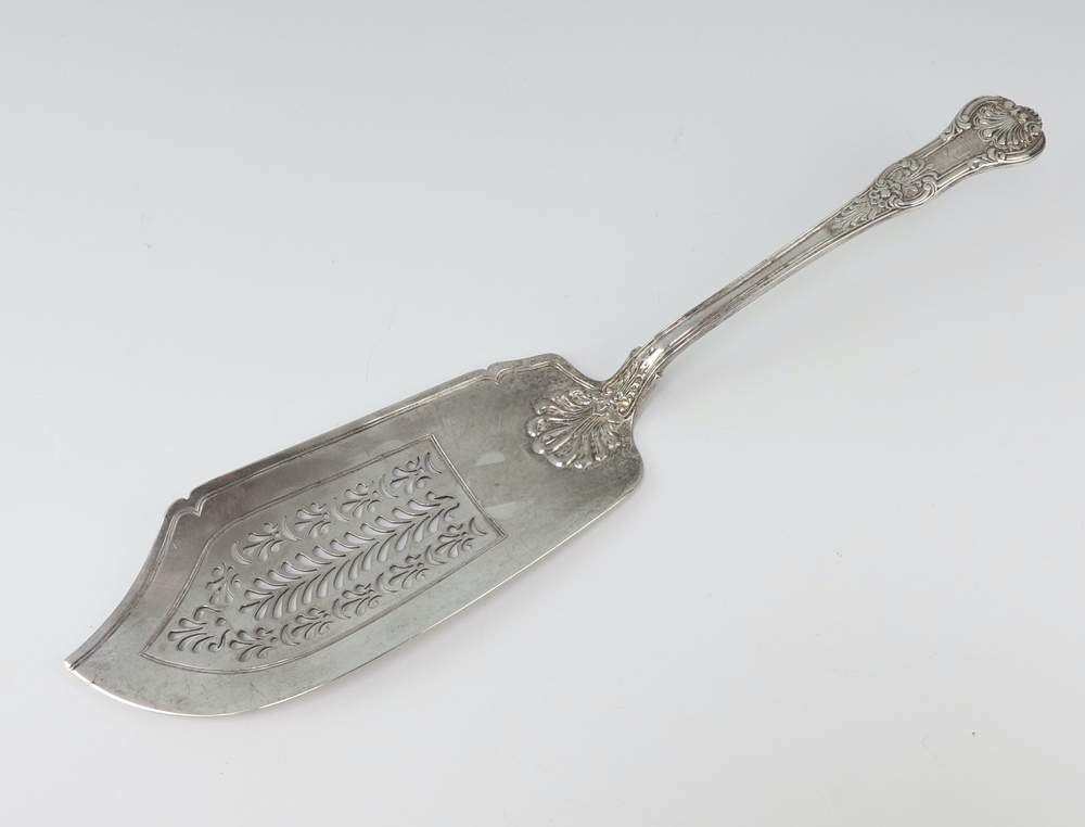 A William IV silver Kings pattern fish slice with pierced decoration and engraved monogram, London