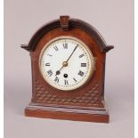 An Edwardian bracket timepiece with 14cm enamelled dial, Roman numerals, contained in a mahogany