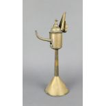 An 18th Century Dutch brass whale oil lamp, raised on a spreading foot 37cm h x 13cm w x 10cm d