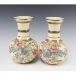 A pair of late Japanese Satsuma club shaped vases with floral and bird decoration 23cm