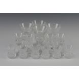 A suite of Edinburgh Crystal thistle shaped glassware comprising 4 small wine glasses, 6 liqueur