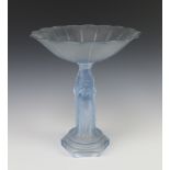 An Art Deco blue pressed glass table centrepiece supported by 3 ladies with circular shaped bowl