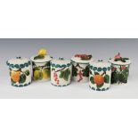 Six Griselda Hill Pottery cylindrical preserve jars decorated fruits 6cm