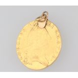 A spade guinea 1788, 8.6 grams, with soldered yellow metal mount