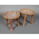 A pair of Ethiopian circular stools with turquoise and polished stone inlay 33cm h x 36cm diam.