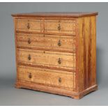 A Victorian aesthetic movement inlaid pitch pine chest fitted 2 short and 3 long drawers, raised