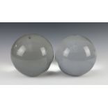 Two circular blown glass spheres 20cm