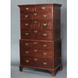 A Georgian mahogany chest on chest with moulded cornice, fitted 2 short and 2 long drawers, above