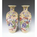 A pair of Japanese late Satsuma porcelain vases decorated courtly figures 39cm