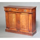 A 19th Century mahogany chiffonier fitted a drawer with brass drop handles above cupboard enclosed