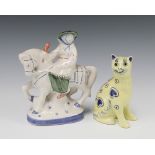 A Rye Pottery figure of a lady riding a horse 19cm together with an unmarked yellow glazed pottery