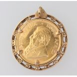 A half Krugerrand 1995 contained in a 4.3 gram 9ct mount