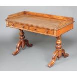 A Victorian bleached mahogany washstand/writing table with 3/4 gallery, fitted 2 drawers, raised