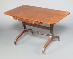 A 19th Century mahogany writing/library table fitted a frieze drawer on square supports with
