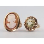 A 9ct yellow gold quartz dress ring and a cameo ditto, both size L, 10 grams