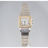 A lady's steel cased Cartier Santos de Cartier automatic wristwatch the dial with a gilt coronet