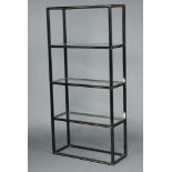 Pierre Vandel of Paris, a tubular black and gilt metal 4 tier bookcase/shelving unit 190cm h x