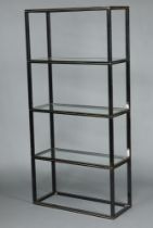 Pierre Vandel of Paris, a tubular black and gilt metal 4 tier bookcase/shelving unit 190cm h x