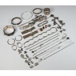 A silver bracelet and minor silver jewellery including bangles, necklaces, earrings etc, gross