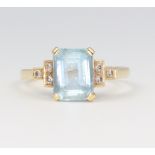 An 18ct yellow gold topaz and diamond ring size O, 3.4 grams