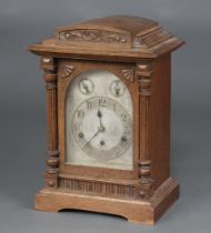 An early 20th Century German 8 day striking on gong bracket clock, the 17cm dial with Roman