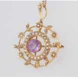 A 9ct yellow gold necklace 40cm with a 15ct yellow gold amethyst and seed pearl pendant, the chain