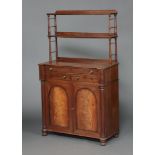 A Regency mahogany chiffonier, the raised back fitted 2 shelves, the base fitted a drawer with